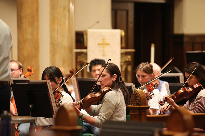 Members of the Dickinson College Orchestra perform in 2023.