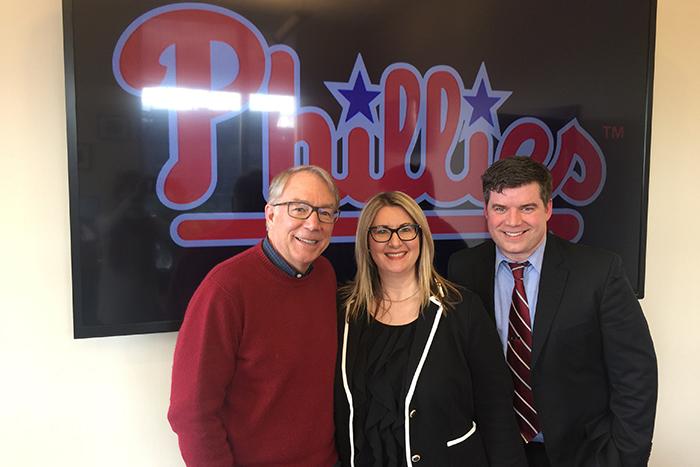 Andy MacPhail '76 with 'The Good' producers Christine Baksi and Craig Layne