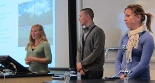 Photograph of students presenting their research