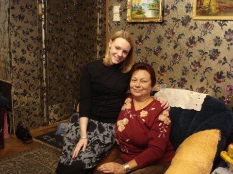 student with picture of host mother in Moscow