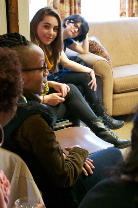 Female students exchanging ideas during an event at Landis.