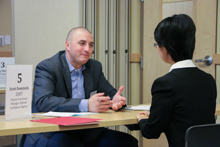 Scott Dominick '07, deputy functional manager at the
Defense Intelligence Agency, was one of many alumni who participated in mock interviews with students during the Career Conference.