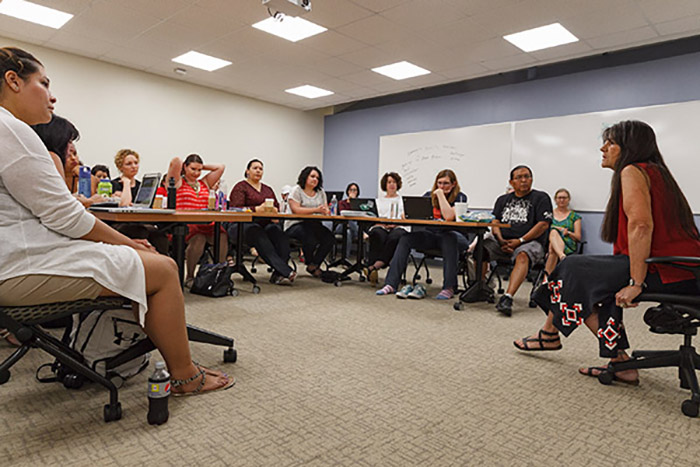 Participants attended a workshop led by Lakota/Kiowa Apache storyteller, cultural educator, author and recording artist Dovie Thomason to learn how to utilize the CISDRC and storytelling in their teachings. Photo courtesy of Carl Sander Socolow '77.