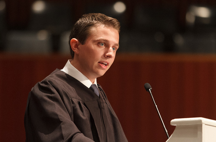 Austin Davis '15 delivers the Student Senate president's address during the 2014 Convocation ceremony. Photo by Carl Socolow '77.