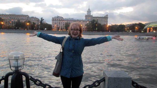 Danielle Collette stands in front of the river in Moscow.