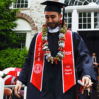 Andy Vargas ’16 steps forward during Commencement