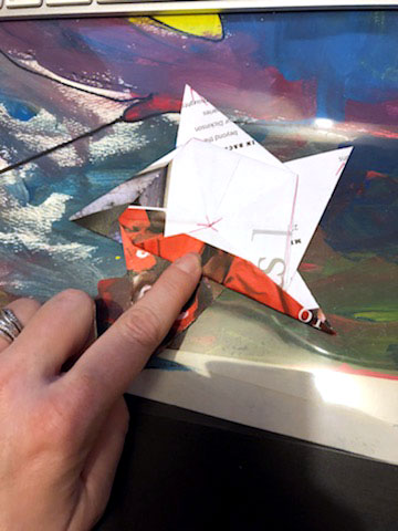 Figure 13 make origami paper star.