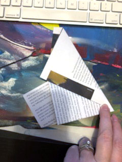 Figure Two make origami paper star.