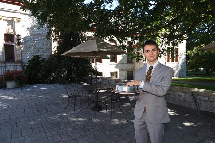 Political-science major James Cerasia '18, who worked on the business plan for the new GATHER pop-up, holds a tempting surprise. Cerasia will be among the student volunteers who will help serve diners during the September event. Photo by Carl Socolow '77.