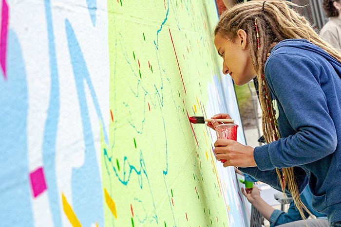 Larissa Babicz '20, a biology major, was a student-assistant for the mural project. Photo by Carl Socolow '77.