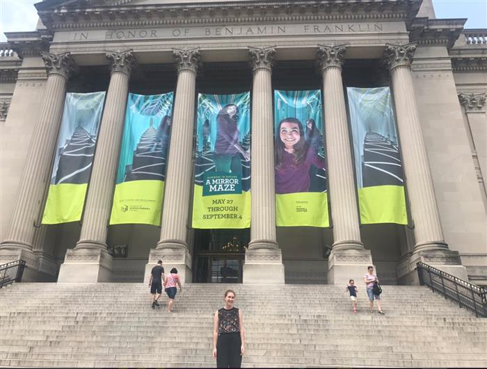 Molly Gorelick '19 stands in front of The Franklin Institute as the Social Media Intern.