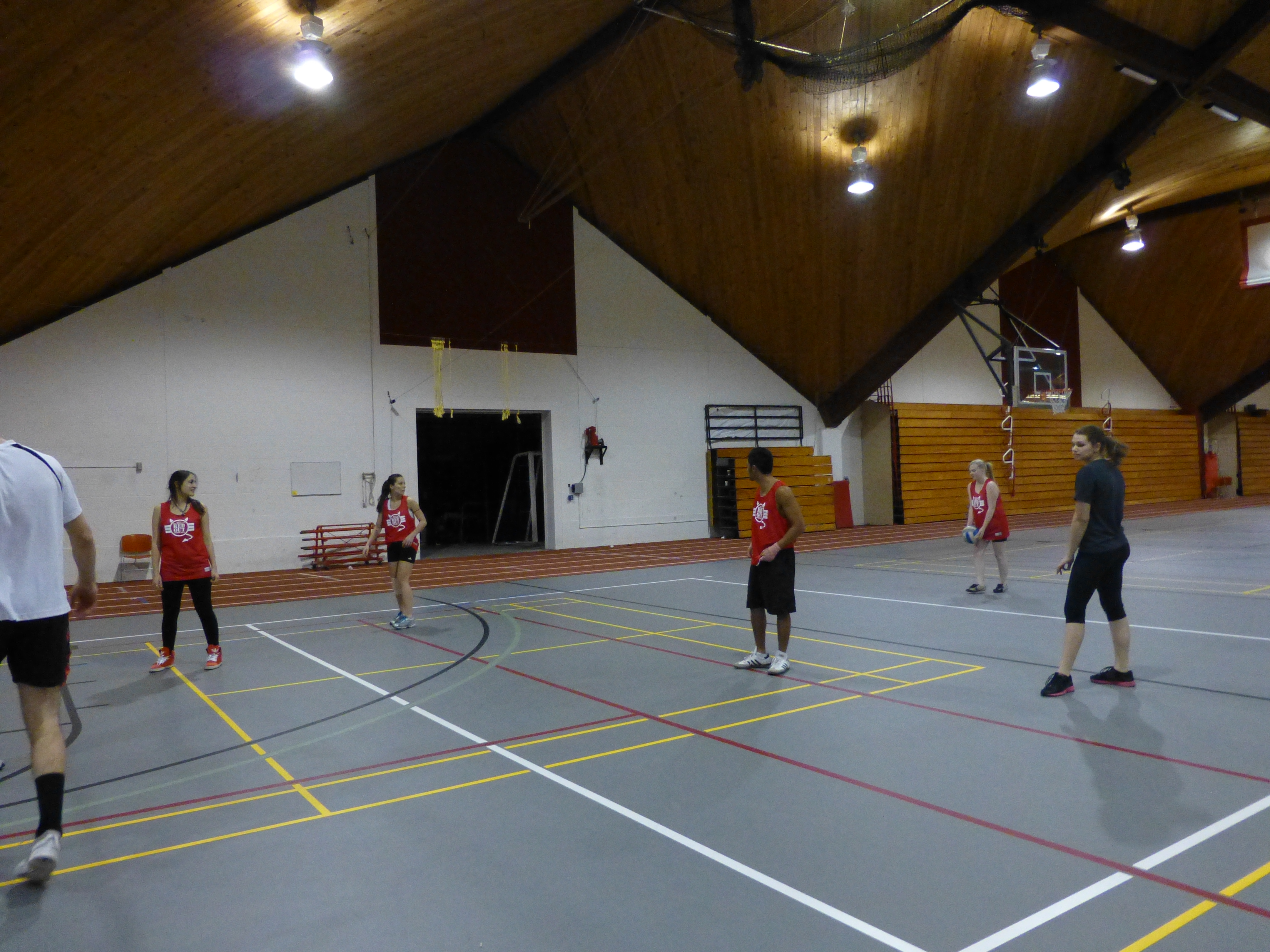 Students playing intramural volleyball in the Kline Center.