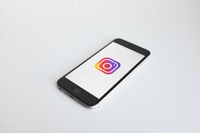 An iPhone with the Instagram logo.