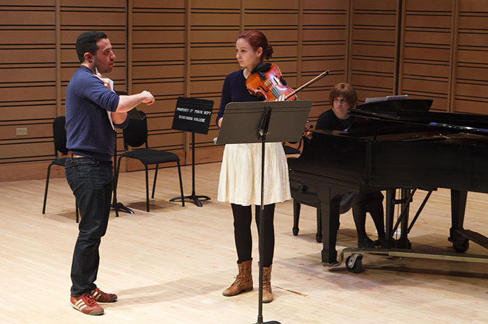 Music major Elizabeth Johnsen '17 gets personalized tips during a March 27 master class conducted by JACK Quartet, one of nearly a dozen artists-in-residence to visit Dickinson this year.