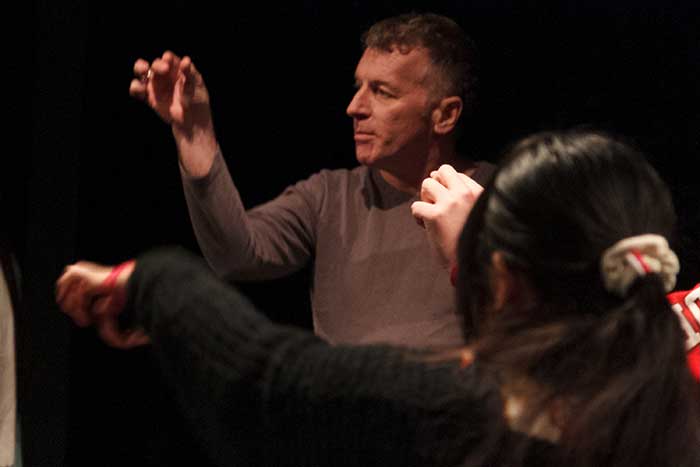 Mime Bill Bowers directs students during a past Dickinson residency. 