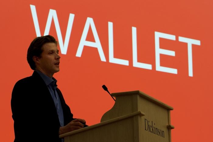 Alec Ross takes to the podium to discuss bitcoin.