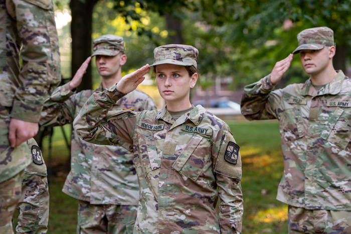 ROTC cadets stand at attention 