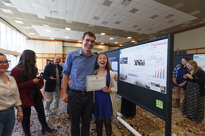 Physics majors Emily Whitaker and Sean Jones, both of the class of 2017, earned honors for their interactive presentation on a solar air-heater-enhanced biogas digester for the College Farm.