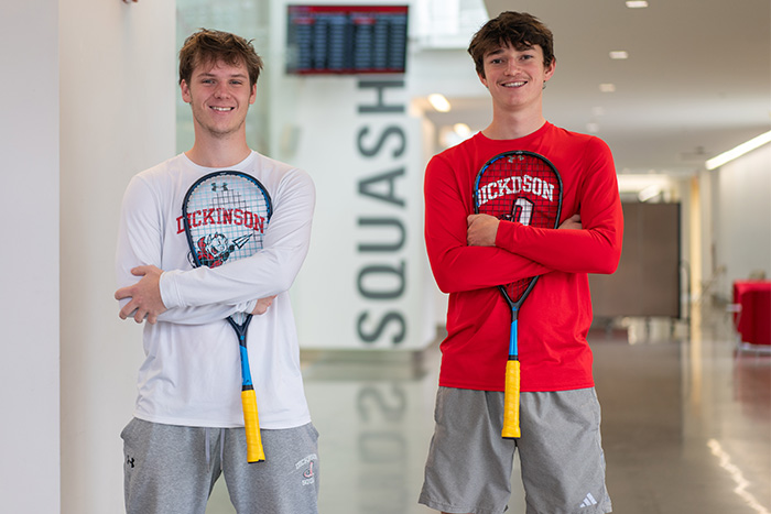 Kobe Fleming '24 (left) and Joe Smyth '25 grew up playing squash together in New Zealand. Photo by Dan Loh.