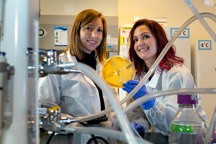 Data collected by a student-faculty research team led by Kristin Strock (left) and Dana Somers has implications for methane emissions from Arctic lakes.