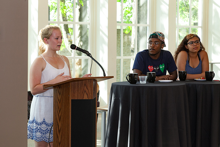 From left: Meredith Johnson '18, Muhajir Lesure ’20 and Carol Fadalla '18 discuss their summer research during the first "Tea" event of the semester.