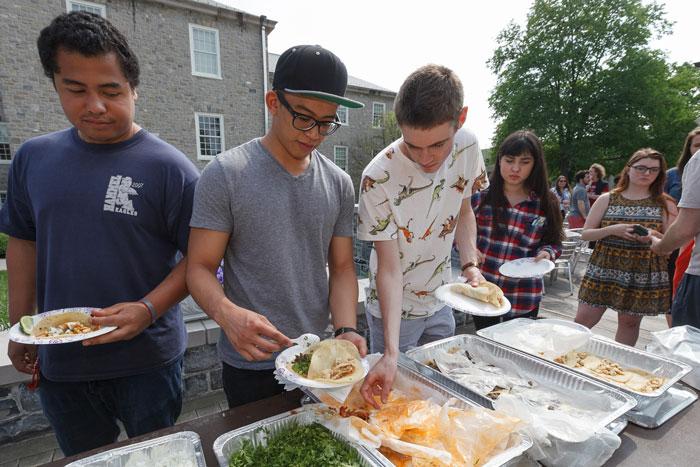 students line up for tacos