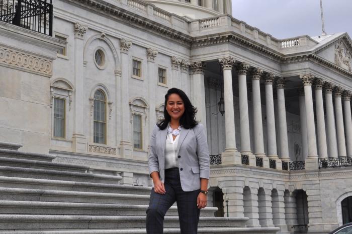 Valeria Carranza poses in from of a Congressional building in Washington DC