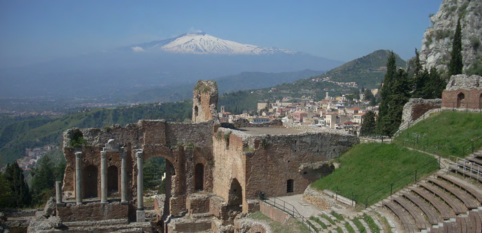 Visit this ancient Greek theater in Taormina with a view of Mt. Etna. © Łukasz Stachowiak
