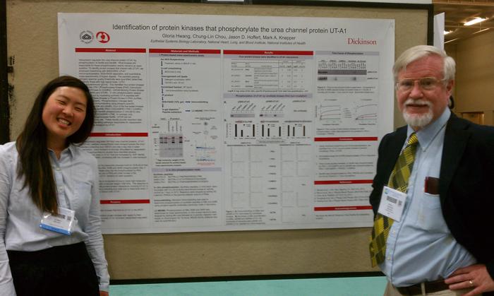 Gloria Hwang '16 with Mark A. Knepper at her presentation at the 2014 Experimental Biology Conference.