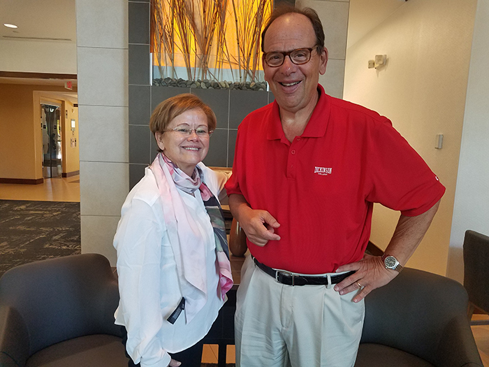 Lou Grossman '73 poses with President Margee Ensign during her Useful Education for the Common Good tour.