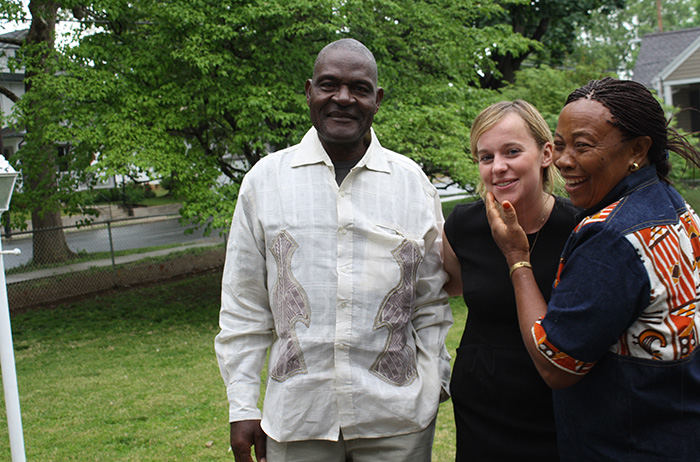 Molly DiLeonardi '15 (center) with her Cameroonian host parents, Daniel and Rose Tchounchui.