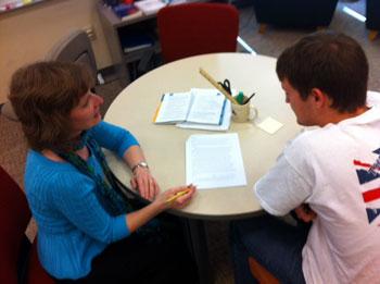 Picture of Noreen Lape consulting with tutor Brian Reiger