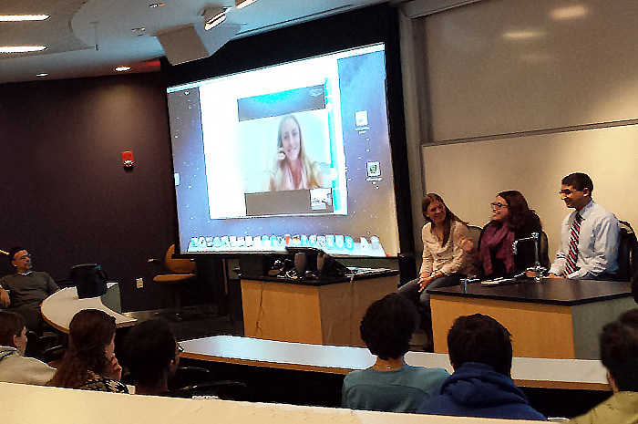 Emily Swain '10 chats about her experiences as a science teacher during a career-discussion event with Allison Hall '11 (seated, far left) and Adnan Solaiman '10 (seated, far right). Katie McCann '11 (onscreen) weighed in on the conversation via Skype.