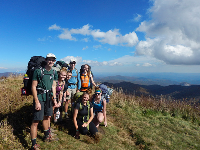 The Outing Club pauses during a hike during the 2014 fall pause.