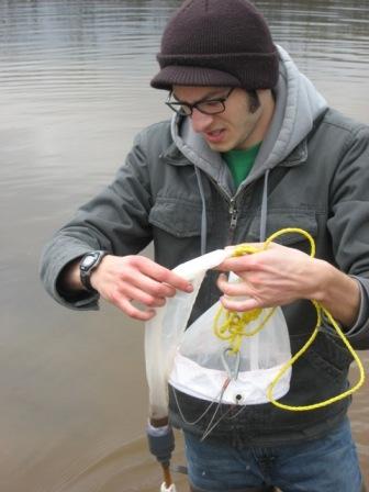 Student conducting plankton samples.