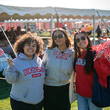 Students attending the Homecoming and family weekend football game tailgate