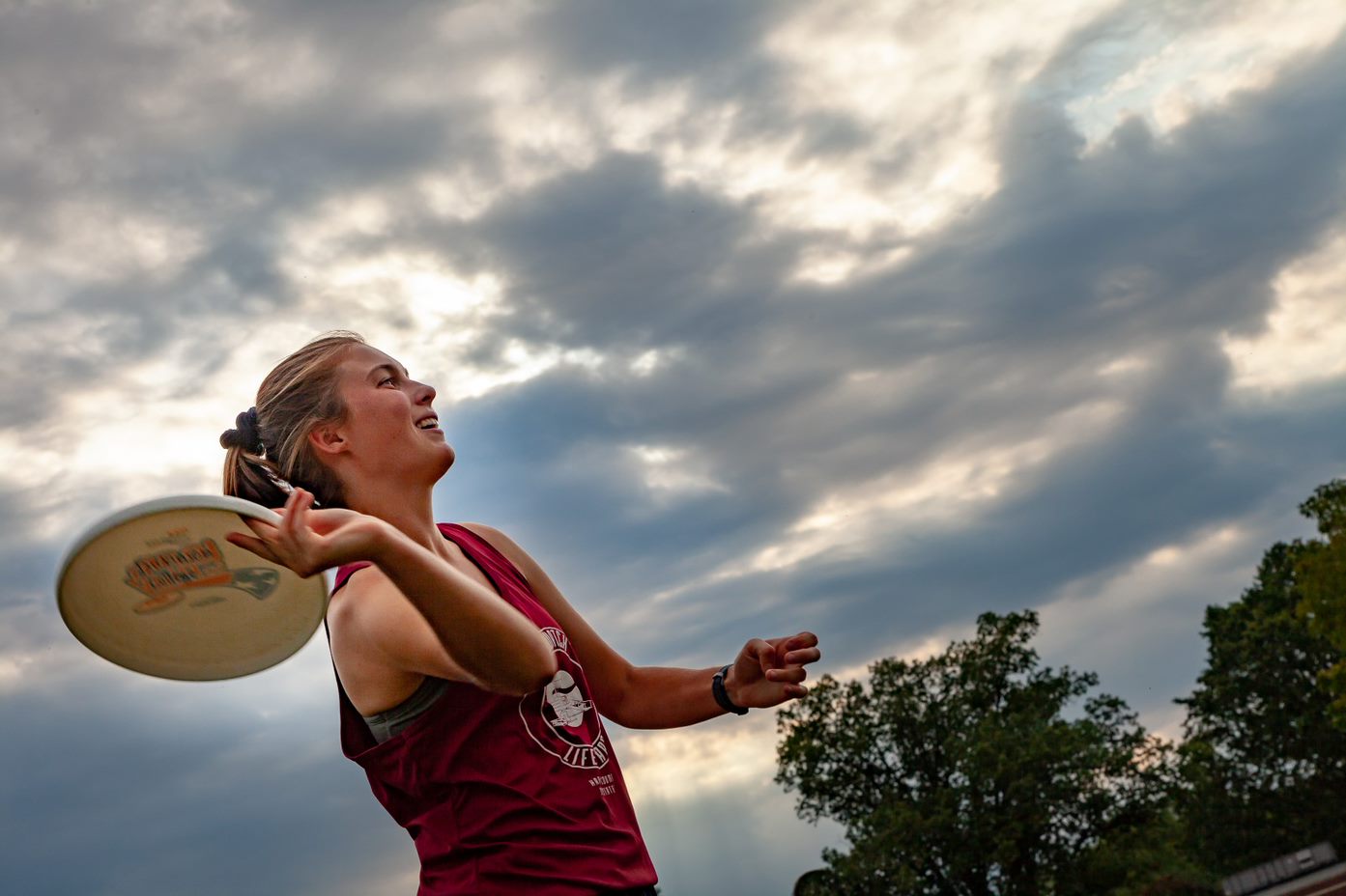 Senior women's captain Katie Overstrum prepares to throw a frisbee during practice.