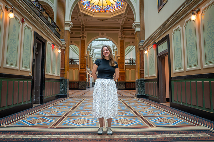 Abigail Allport '26 stands in the Smithsonian Museum, where she completed a summer internship.
