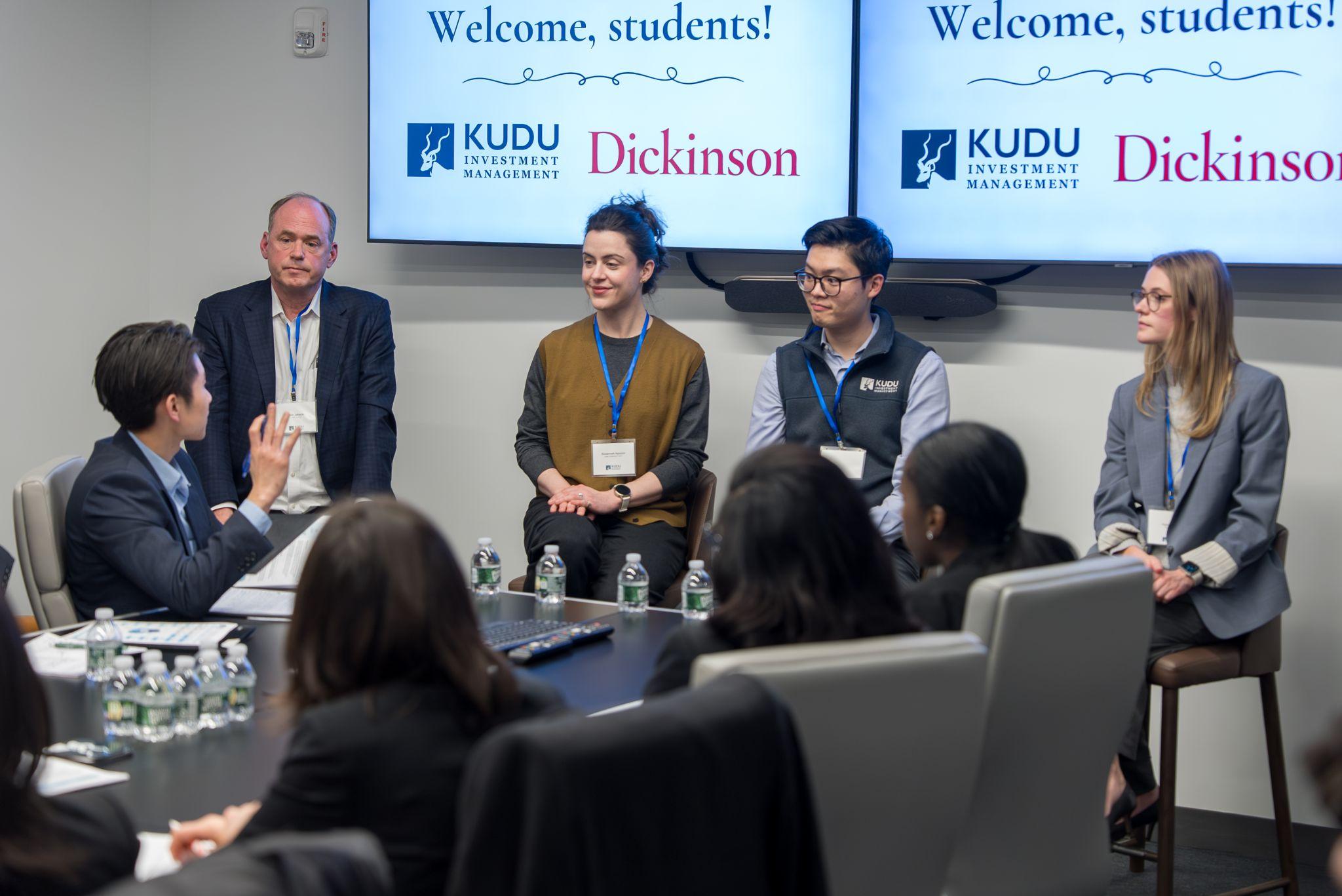 An alumni panel from Kudu speaks in front of Dickinson College students. 