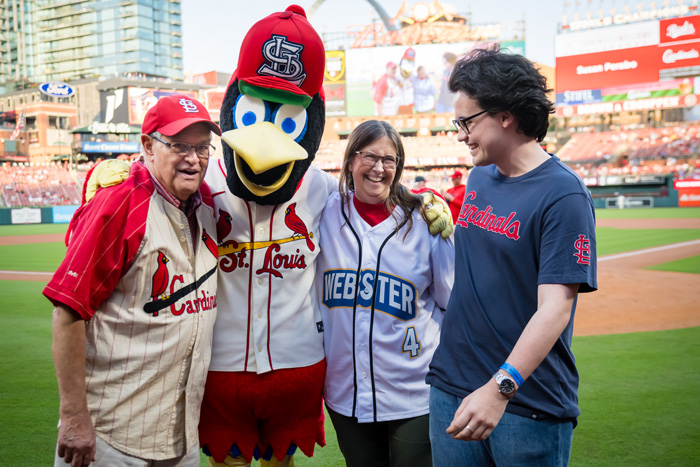 Susan Perabo with her family at the St. Louis cardinals' field.