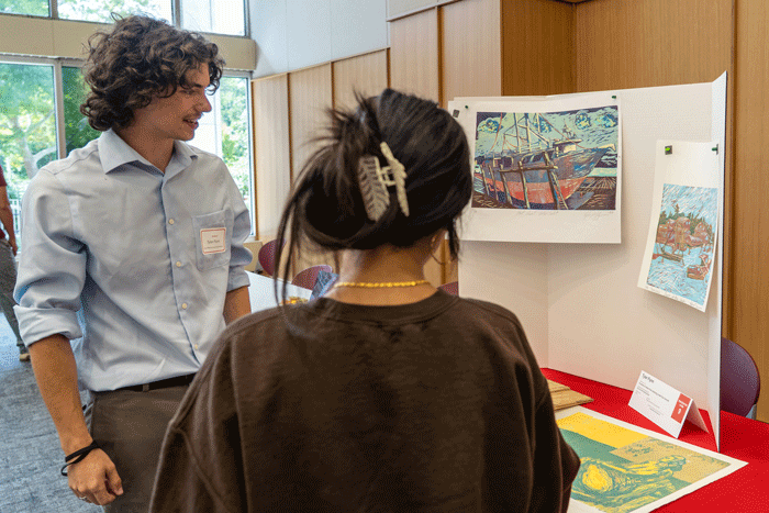 Tyler Flynn ’28 talks about his summer art internship. Photo by Alex Sonfield '25.