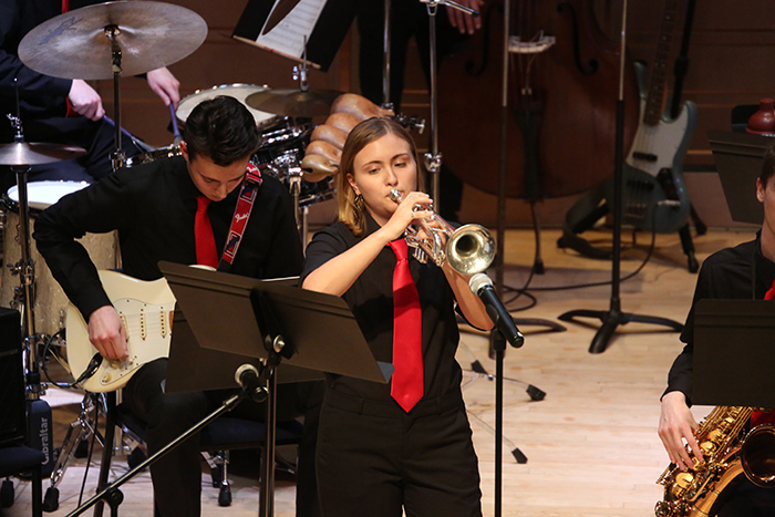 jazz ensemble student playing a trumpet