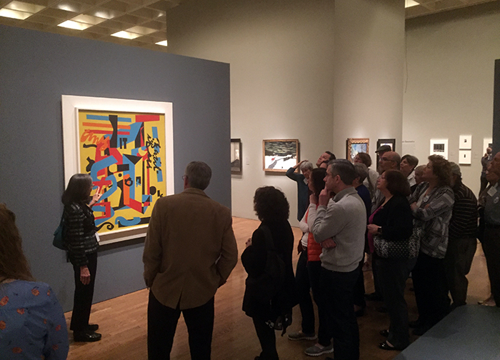 Alumni and friends of the college learn what to look for in paintings during a private tour of the Philadelphia Museum of Art.teaches alumni and friends of the college what to look for in paintings at the Philadelphia Museum of Art.