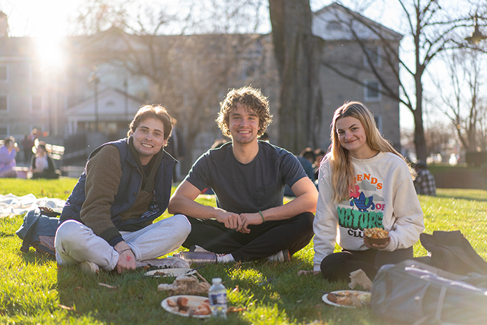 Students enjoy a picnic outside during a March 30 Dining Services special event.