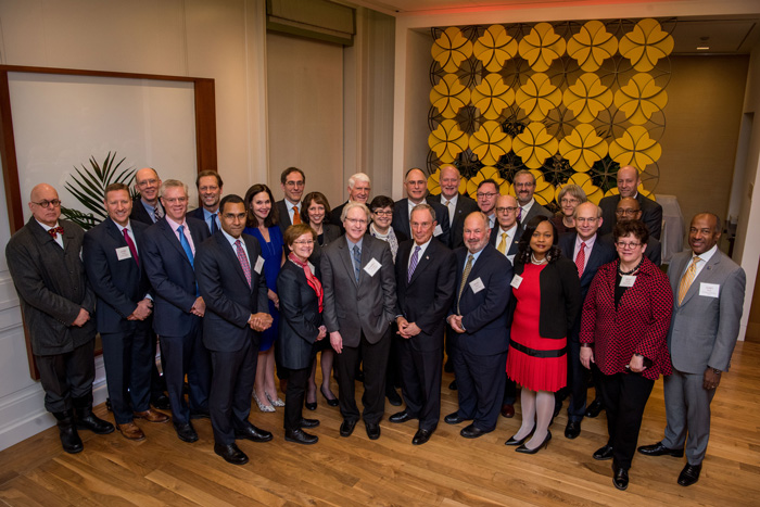 Dickinson College President Margee Ensign poses with Michael Bloomberg and the presidents of the other American Talent Initiative member schools at the summit.