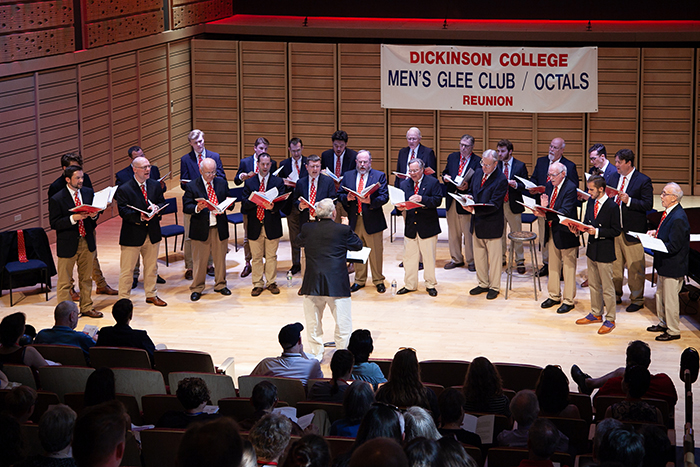 After a brief rehearsal, former members of the Octals and Glee Club gathered to perform for fellow alumni.