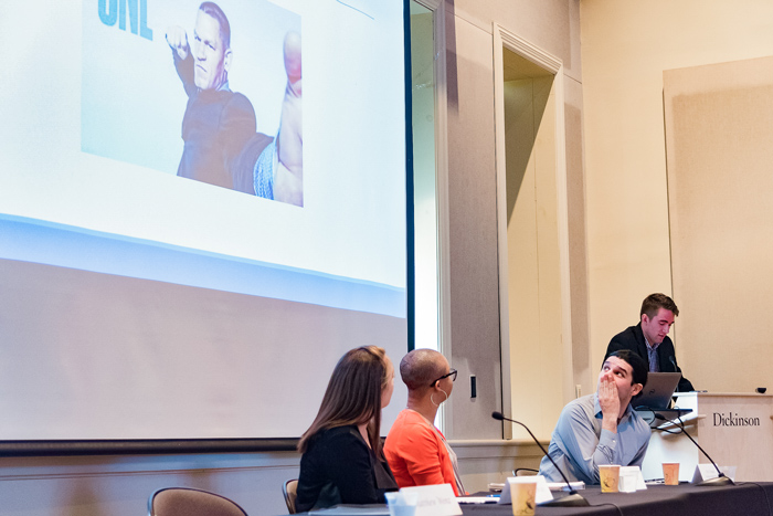 Matthew Wenz '17 presents his research on the construction of masculinity in WWE performances. Photo by Wes Lickus '17.