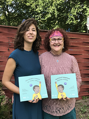 Avigal Fishelov and her mom, Nitsa Kann, pose with the book they wrote together.