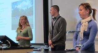 Photograph of students presenting their research