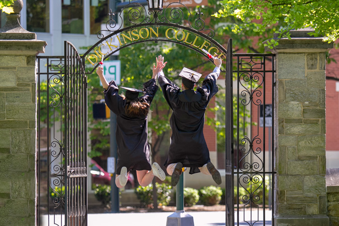 Graduates jumping